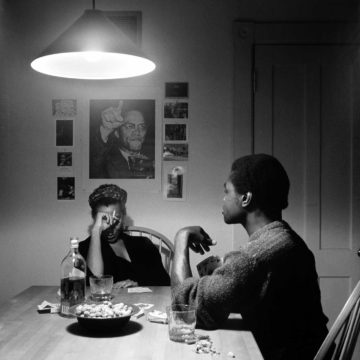 Carrie Mae Weems, Untitled (Playing Cards/Malcolm X) from the Kitchen Table II series, 1990, printed 1999, gelatin silver print, edition 2/5, 26 ¾ × 26 ⅞ inches. Museum purchase with funds provided by 2004 Collectors' Circle, 2004.24.04.91. © Carrie Mae Weems.