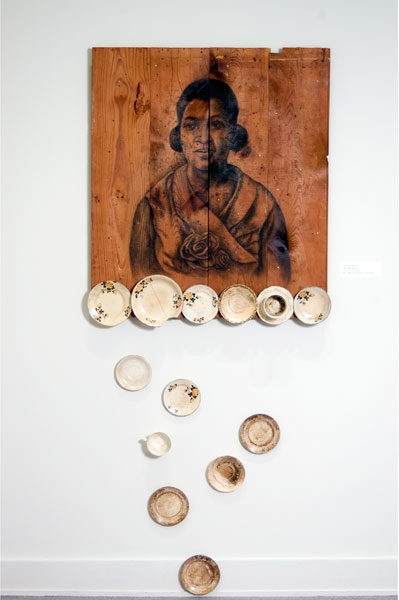 Whitfield Lovell, One of These Days, 2006, charcoal and china on wood, 84 × 37 × 4 ½ inches. Museum purchase with funds provided by 2007 Collectors’ Circle with additional funds provided by Phillip Broughton & David Smith, 2007.33.01.29. © Whitfield Lovell