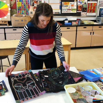 Summer Art Camp teacher at work in the studio.