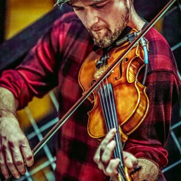 Alex Travers playing violin
