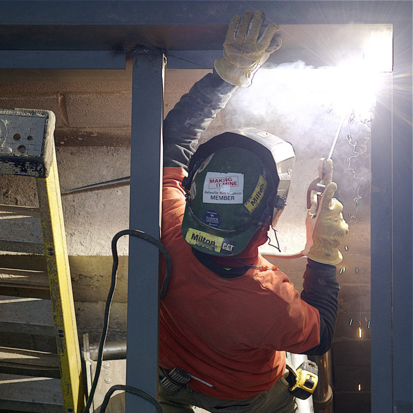 Construction team member works on site.